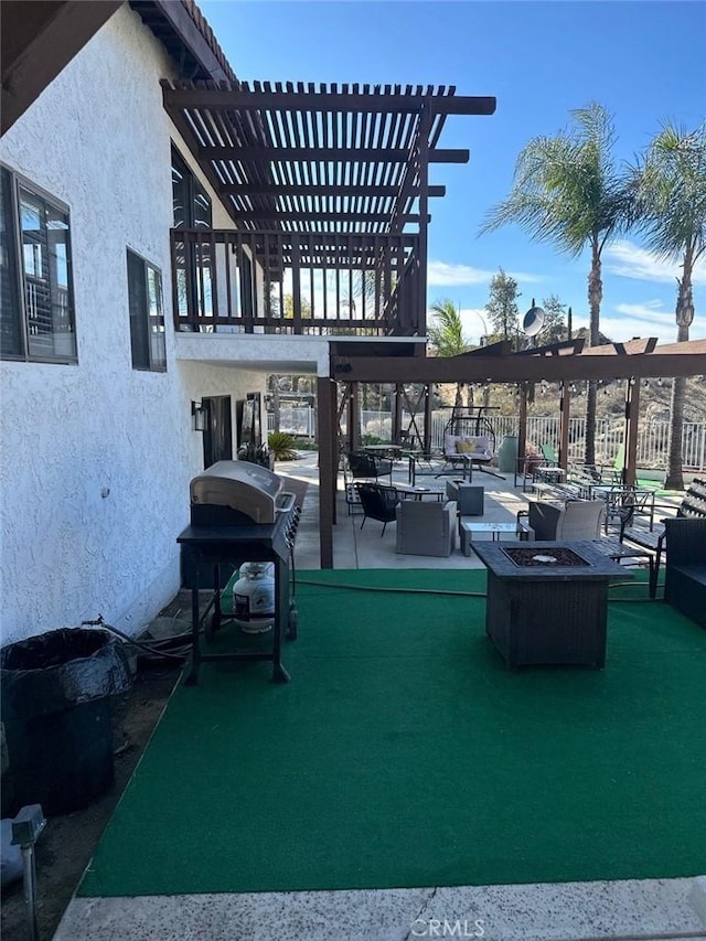 20515 Bushton Pl, Perris, CA 92570 - view of patio / terrace featuring an outdoor living space with a fire pit, a pergola, and a grill