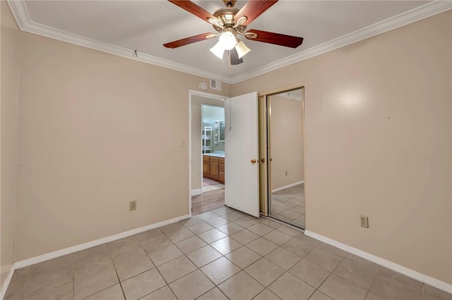 507 W La Jolla St, Placentia, CA 92870 - empty room featuring a ceiling fan, ornamental molding, and light tile patterned flooring