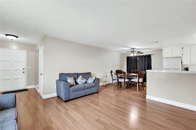 507 W La Jolla St, Placentia, CA 92870 - living room with light wood finished floors and a ceiling fan