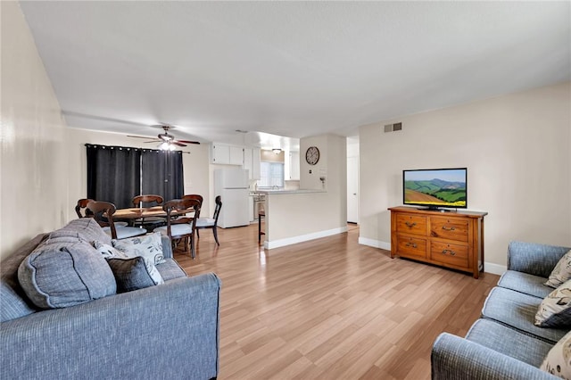 507 W La Jolla St, Placentia, CA 92870 - living area featuring light wood-style floors and ceiling fan