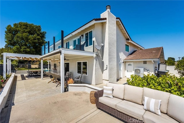6021 Saddletree Ln, Yorba Linda, CA 92886 - back of property featuring an outdoor living space, stucco siding, ceiling fan, a fenced backyard, and a patio