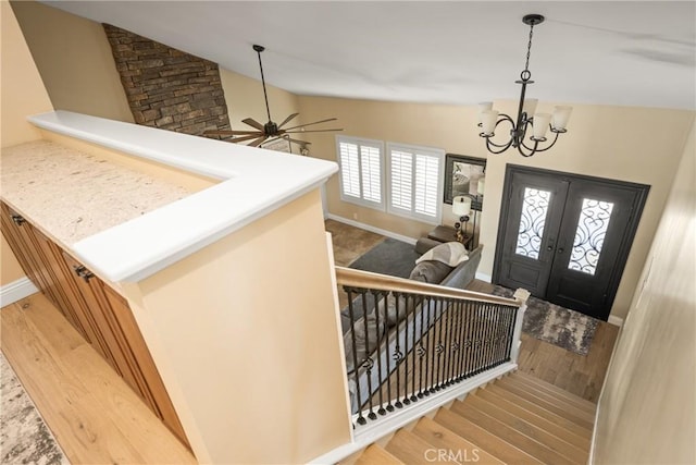 6021 Saddletree Ln, Yorba Linda, CA 92886 - entrance foyer with vaulted ceiling, wood finished floors, a chandelier, ceiling fan, and french doors