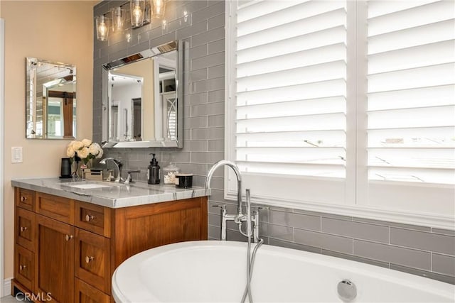6021 Saddletree Ln, Yorba Linda, CA 92886 - full bathroom featuring a bathtub, vanity, and tasteful backsplash