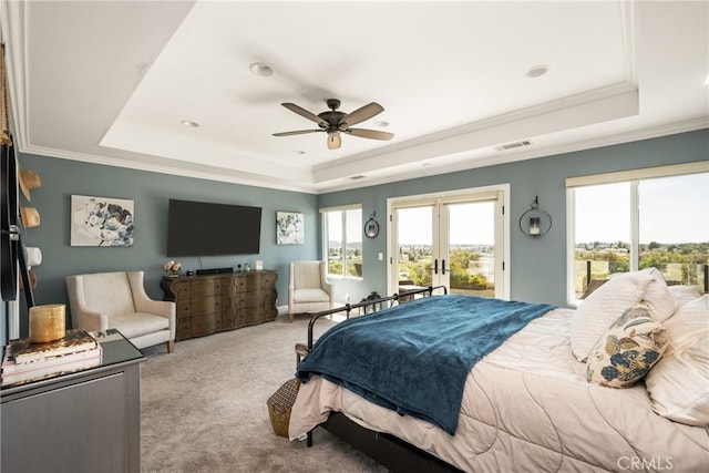 6021 Saddletree Ln, Yorba Linda, CA 92886 - carpeted bedroom with a tray ceiling, access to outside, multiple windows, ornamental molding, and a ceiling fan