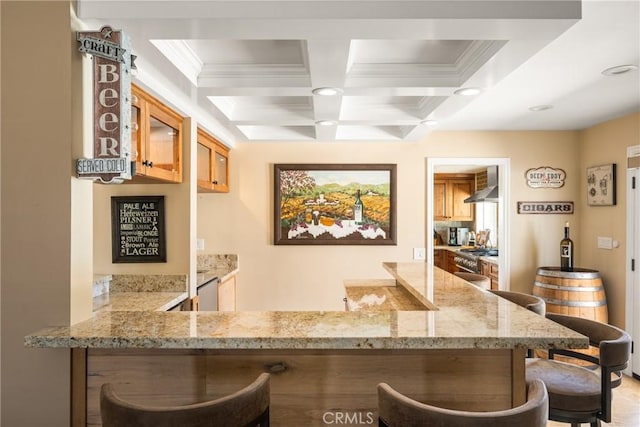 6021 Saddletree Ln, Yorba Linda, CA 92886 - bar area with coffered ceiling, beam ceiling, crown molding, wall chimney range hood, and recessed lighting