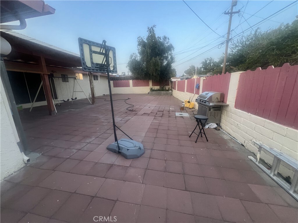 3401 Purdue Dr, Bakersfield, CA 93306 - fenced backyard with a patio area and area for grilling