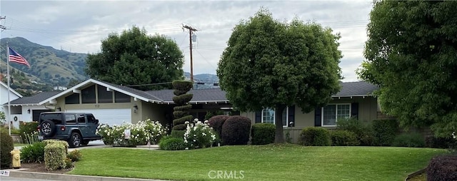 112 S Hacienda Ave, Glendora, CA 91741 - view of front of home with a garage, a front yard, and a mountain view