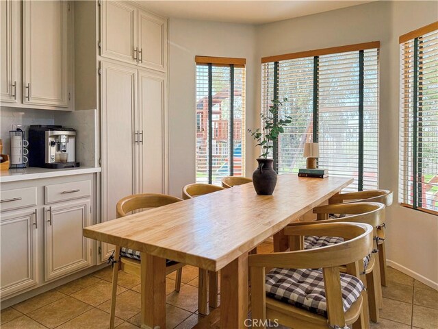 795 Donatello Dr, Corona, CA 92882 - dining space featuring light tile patterned flooring and plenty of natural light