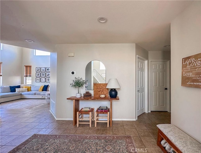 795 Donatello Dr, Corona, CA 92882 - hallway with tile patterned floors and baseboards