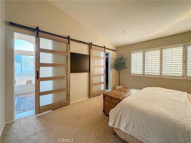 795 Donatello Dr, Corona, CA 92882 - bedroom featuring a barn door, lofted ceiling, carpet flooring, and a closet