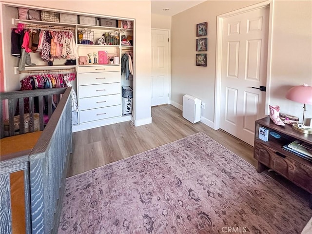 795 Donatello Dr, Corona, CA 92882 - bedroom with wood finished floors and a closet