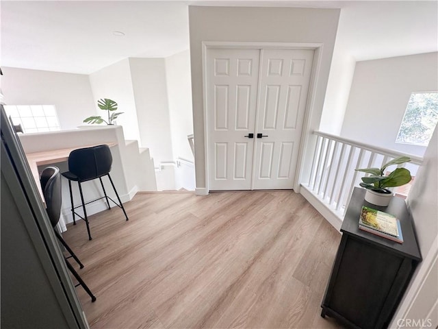 795 Donatello Dr, Corona, CA 92882 - office area with light wood-style floors and baseboards