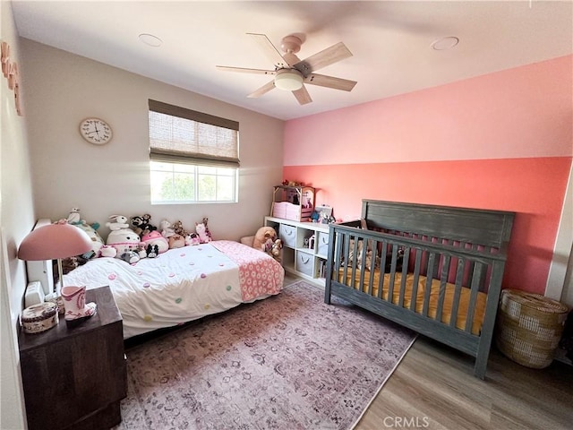 795 Donatello Dr, Corona, CA 92882 - bedroom with wood finished floors and ceiling fan