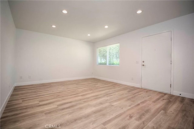 26769 Cherry Hills Blvd, Menifee, CA 92586 - empty room with recessed lighting, light wood-style floors, and baseboards