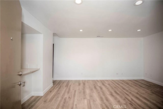 26769 Cherry Hills Blvd, Menifee, CA 92586 - unfurnished room with light wood-style flooring, baseboards, and recessed lighting