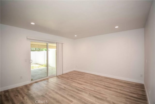 26769 Cherry Hills Blvd, Menifee, CA 92586 - spare room with light wood-style flooring, baseboards, and recessed lighting