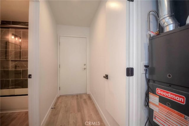 26769 Cherry Hills Blvd, Menifee, CA 92586 - hallway with wood finished floors, baseboards, and heating unit