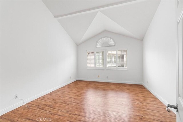 24545 Santa Clara Ave, Dana Point, CA 92629 - unfurnished room featuring light wood finished floors and vaulted ceiling