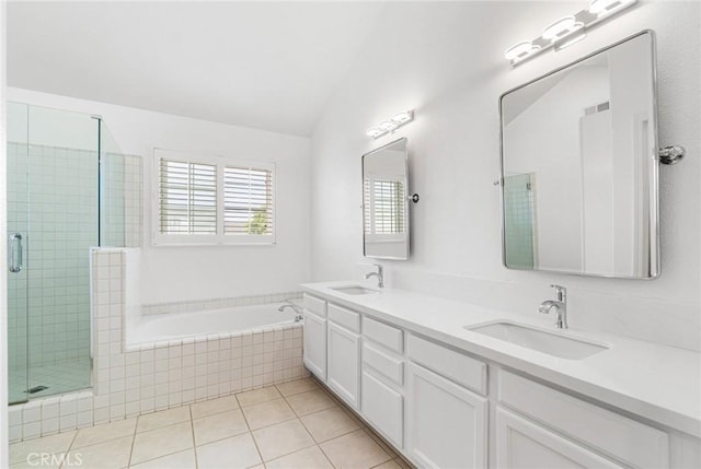24545 Santa Clara Ave, Dana Point, CA 92629 - full bath with a shower stall, double vanity, a garden tub, tile patterned floors, and vaulted ceiling