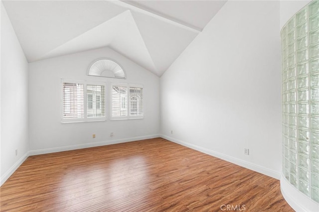 24545 Santa Clara Ave, Dana Point, CA 92629 - spare room with wood finished floors and vaulted ceiling