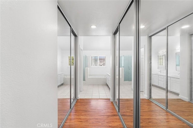 24545 Santa Clara Ave, Dana Point, CA 92629 - hall with light wood-type flooring, plenty of natural light, and recessed lighting
