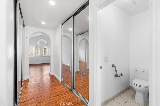 24545 Santa Clara Ave, Dana Point, CA 92629 - corridor with arched walkways, recessed lighting, and light wood-type flooring