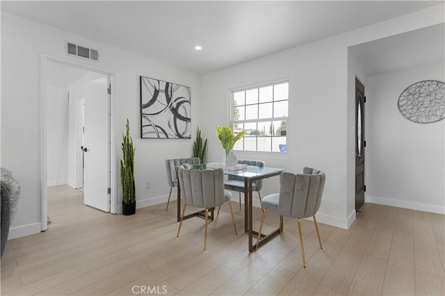 17121 Simonds St, Granada Hills, CA 91344 - dining room featuring light wood-style floors, recessed lighting, and baseboards