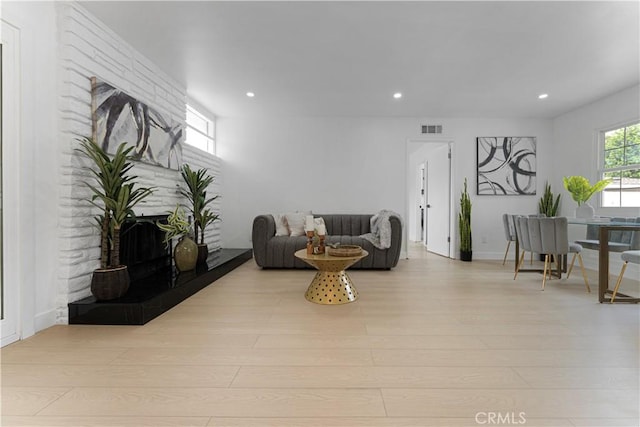 17121 Simonds St, Granada Hills, CA 91344 - living area featuring a fireplace, recessed lighting, and wood finished floors