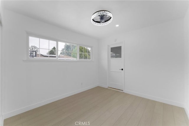 17121 Simonds St, Granada Hills, CA 91344 - unfurnished room featuring light wood-style flooring, baseboards, and recessed lighting
