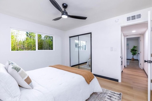 12009 Dresden Pl, Granada Hills, CA 91344 - bedroom with light wood finished floors, a closet, a ceiling fan, and baseboards
