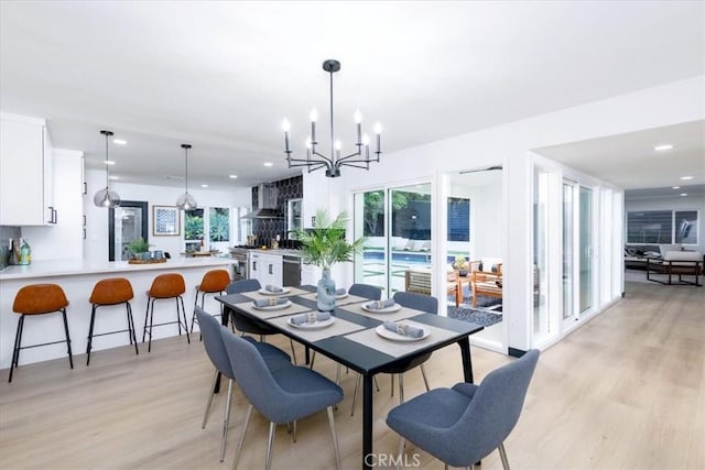 12009 Dresden Pl, Granada Hills, CA 91344 - dining room with a chandelier, light wood-style floors, and recessed lighting