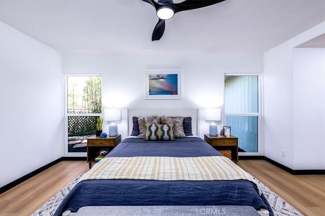 12009 Dresden Pl, Granada Hills, CA 91344 - bedroom featuring baseboards, wood finished floors, and ceiling fan