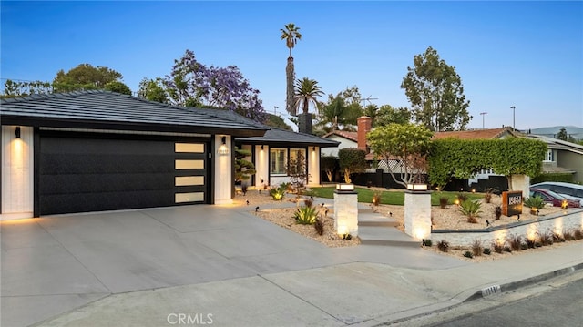19851 Malaga Ln, Yorba Linda, CA 92886 - view of front of property featuring a garage, concrete driveway, and a chimney