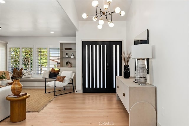 19851 Malaga Ln, Yorba Linda, CA 92886 - entrance foyer with light wood finished floors, a chandelier, and recessed lighting