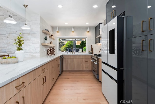 19851 Malaga Ln, Yorba Linda, CA 92886 - kitchen with stainless steel appliances, light brown cabinetry, tasteful backsplash, light stone counters, and light wood-style flooring