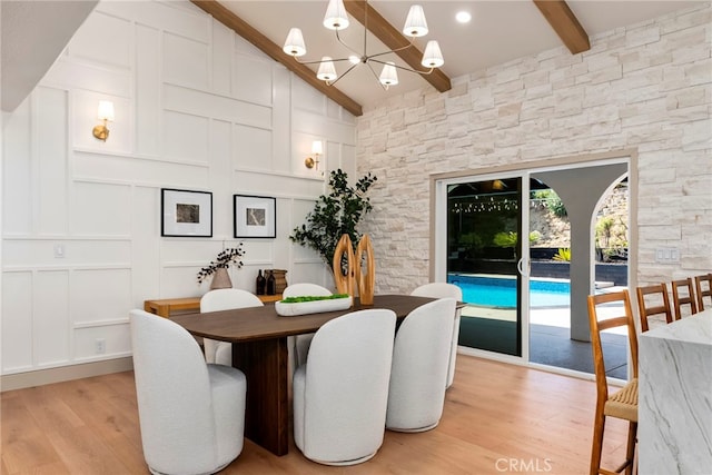 19851 Malaga Ln, Yorba Linda, CA 92886 - dining space featuring light wood finished floors, a chandelier, and a decorative wall