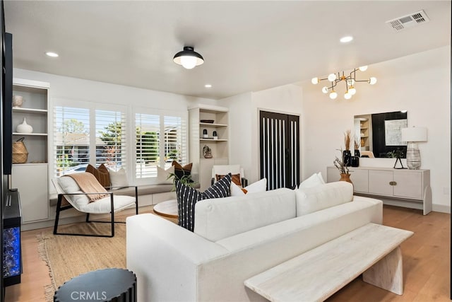 19851 Malaga Ln, Yorba Linda, CA 92886 - living area featuring wood finished floors, a chandelier, and recessed lighting