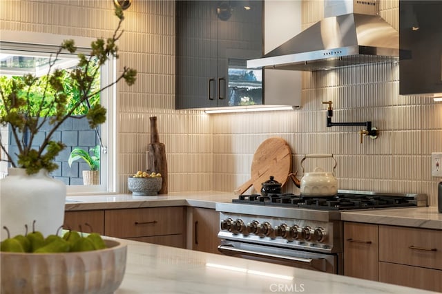 19851 Malaga Ln, Yorba Linda, CA 92886 - kitchen with wall chimney range hood, high end stainless steel range oven, tasteful backsplash, and healthy amount of natural light