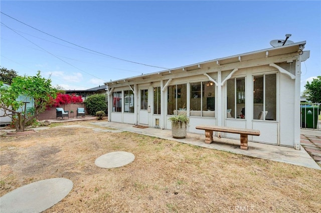 1206 W 187th Pl, Gardena, CA 90248 - back of house featuring a patio and a sunroom