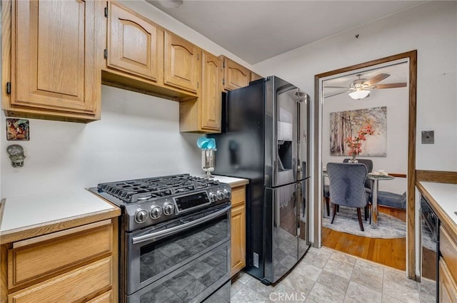 1206 W 187th Pl, Gardena, CA 90248 - kitchen with double oven range, light countertops, refrigerator with ice dispenser, and a ceiling fan