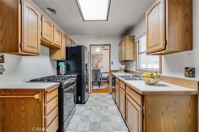 1206 W 187th Pl, Gardena, CA 90248 - kitchen featuring appliances with stainless steel finishes, a sink, light countertops, and stone finish flooring