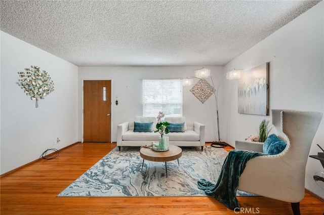 1206 W 187th Pl, Gardena, CA 90248 - living room featuring wood finished floors and a textured ceiling