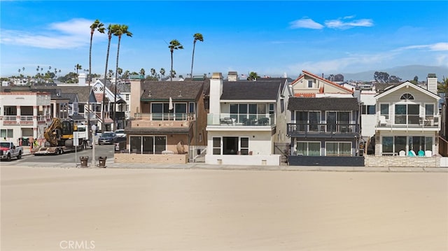 3012 W Oceanfront, Newport Beach, CA 92663 - view of building exterior with a residential view