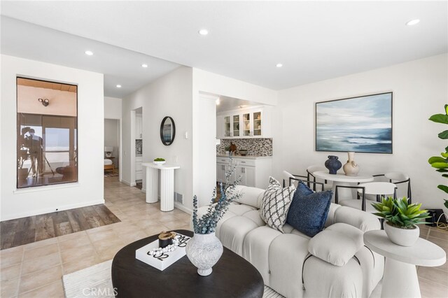 3012 W Oceanfront, Newport Beach, CA 92663 - living area featuring recessed lighting and light tile patterned floors