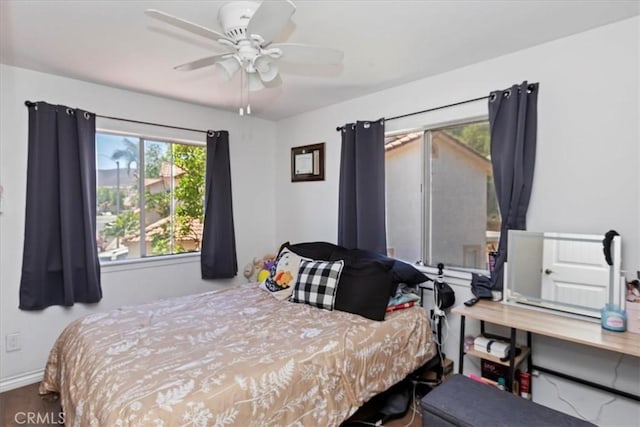 2285 Arabian Way, Corona, CA 92879 - bedroom featuring baseboards and a ceiling fan