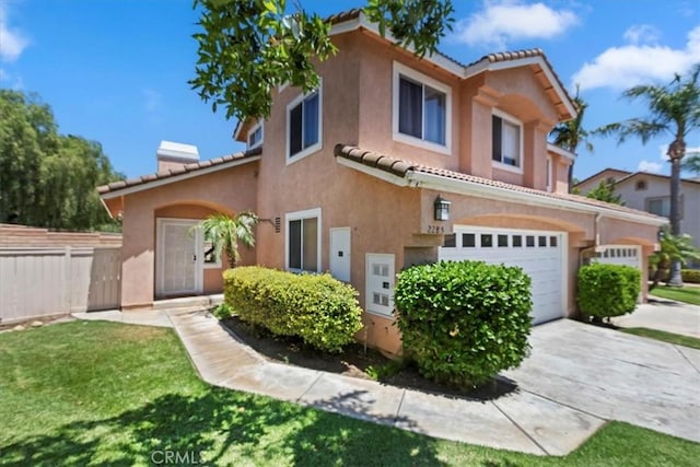 2285 Arabian Way, Corona, CA 92879 - mediterranean / spanish-style house featuring stucco siding, a tile roof, a garage, a chimney, and driveway