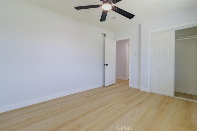 25411 Cottage Ave, Loma Linda, CA 92354 - unfurnished bedroom with light wood-type flooring, a closet, and ceiling fan