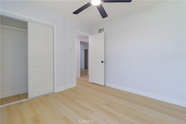 25411 Cottage Ave, Loma Linda, CA 92354 - unfurnished bedroom with light wood finished floors, a closet, and ceiling fan