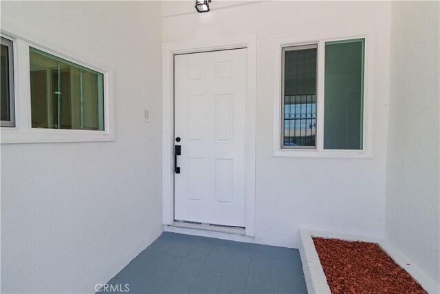 25411 Cottage Ave, Loma Linda, CA 92354 - view of exterior entry featuring stucco siding