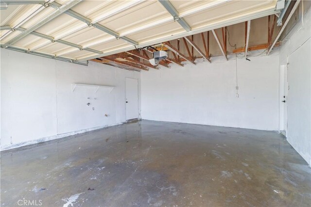 25411 Cottage Ave, Loma Linda, CA 92354 - garage featuring a garage door opener